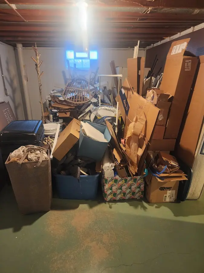 Roll-off dumpster container at job site for Yard Waste Dumpster Rental in West Mead